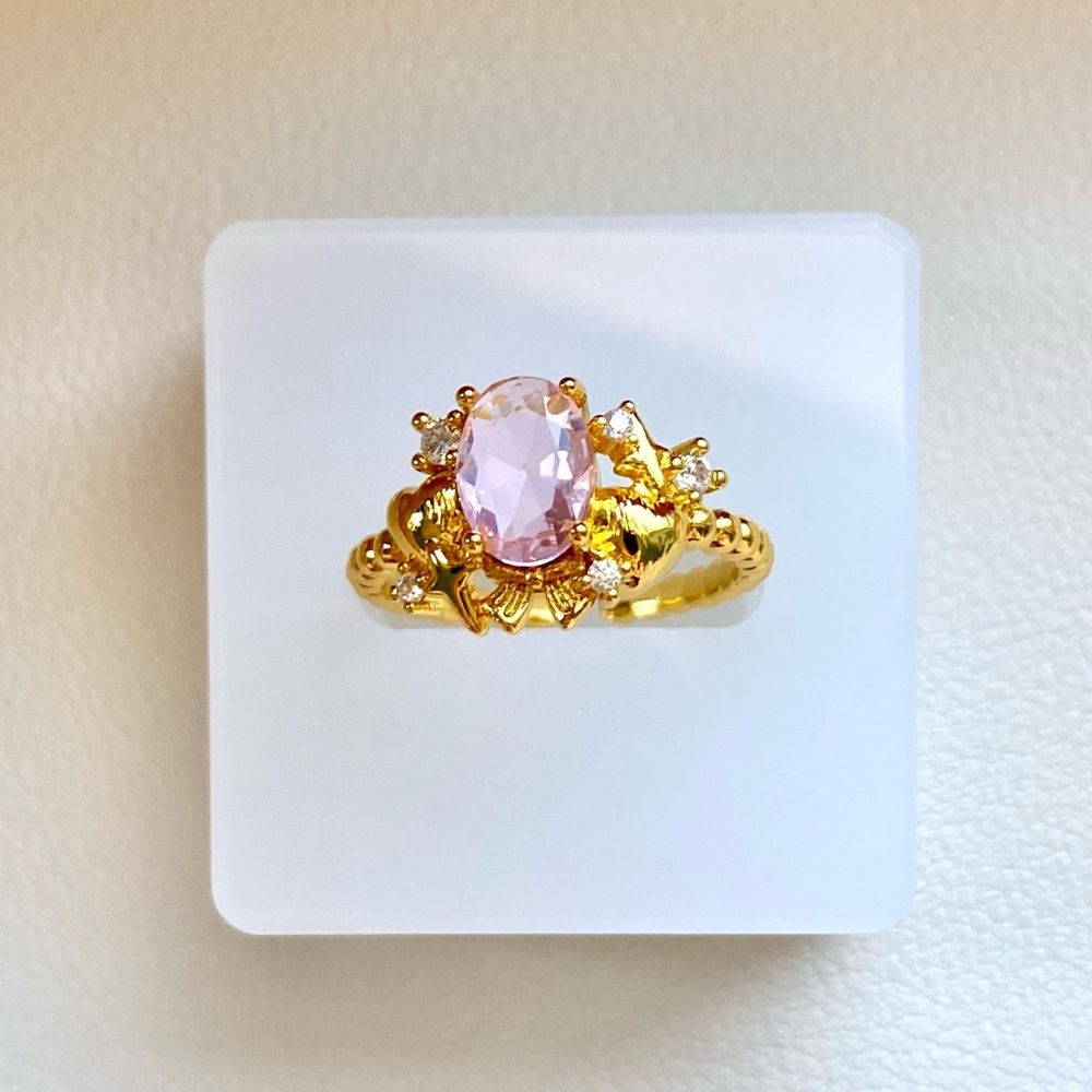 Gold and pink gemstone ring